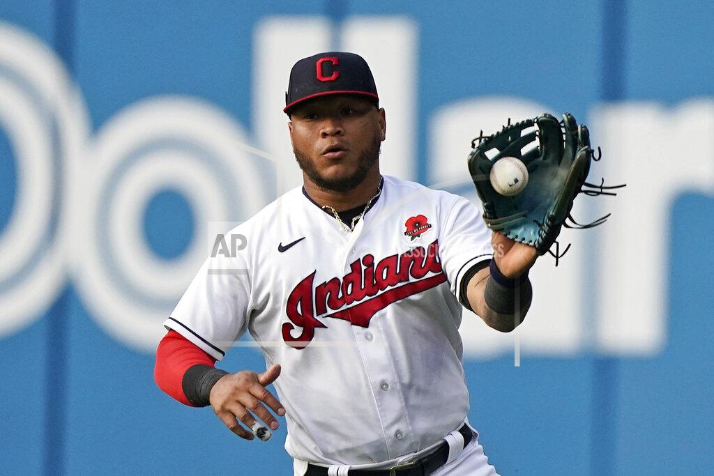 Tony Dejak Cleveland Indians' Harold Ramirez fields a ball hit by Chicago White Sox's Nick Madrigal in the third inning of the second baseball game of a doubleheader, Monday, May 31, 2021, in Cleveland. Madrigal was safe at first base for a single. (AP Photo/Tony Dejak)