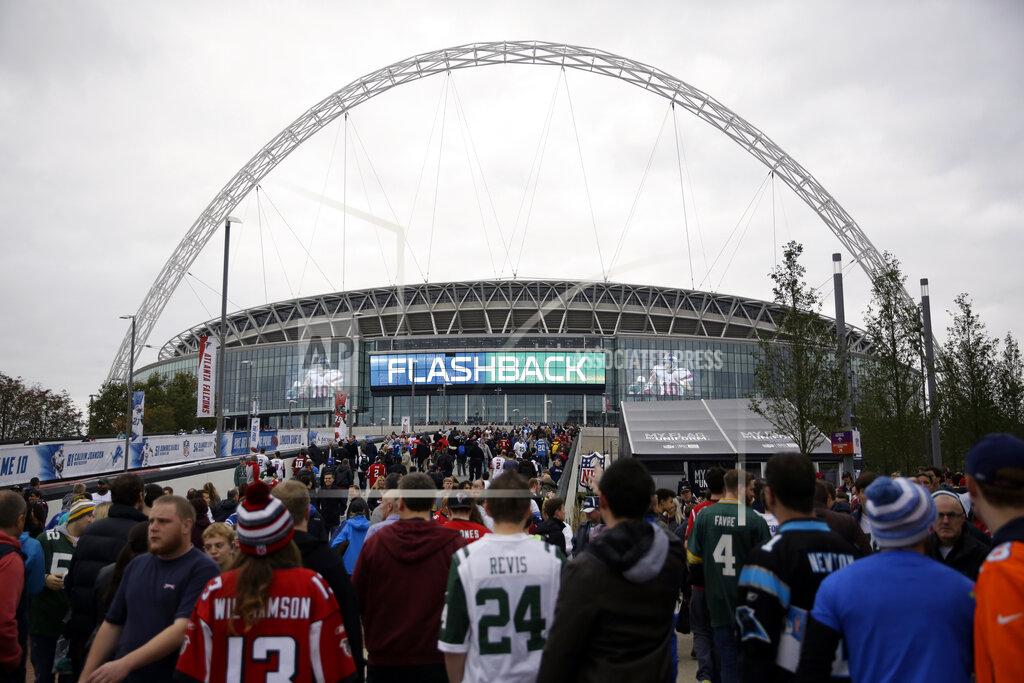 Matt Dunham FILE - In this Oct. 26, 2014, file photo, sans arrive at Wembley Stadium before an NFL football game between the Atlanta Falcons and the Detroit Lions in London. The NFL is moving its five games scheduled for London and Mexico City this season back to U.S. stadiums because of the coronavirus pandemic. All five regular-season games will now be played at the stadiums of the host teams. (AP Photo/Matt Dunham, File)