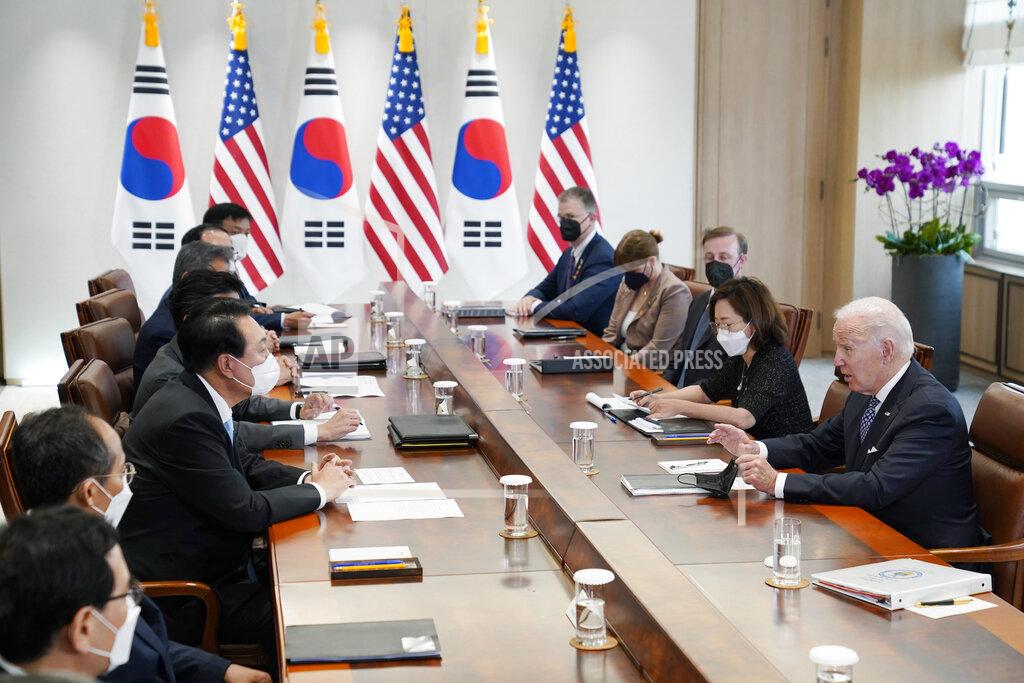Evan Vucci U.S. President Joe Biden, right, speaks during a news conference with South Korean President Yoon Suk Yeol at the People's House, Saturday, May 21, 2022, in Seoul. (AP Photo/Evan Vucci)