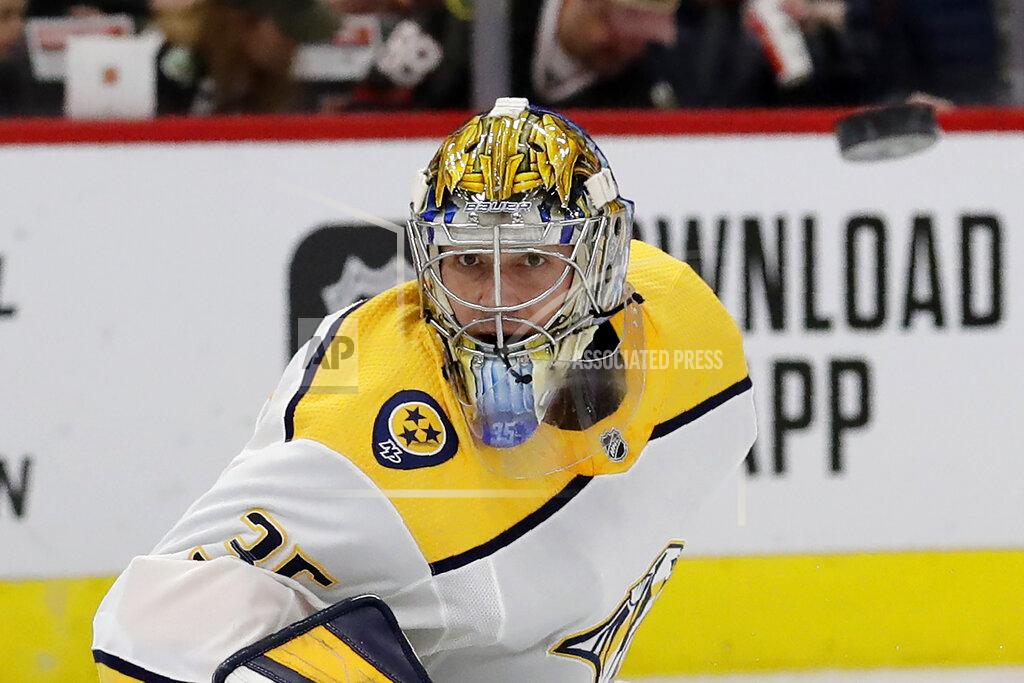 Nam Y. Huh FILE - In this Feb. 21, 2020, file photo, Nashville Predators goalie Pekka Rinne waits for the puck during the first period of an NHL hockey game against the Chicago Blackhawks in Chicago. The NHL's pause has the clock ticking on the career of a former Vezina Trophy winner and four-time finalist with Rinne turning 38 in November. (AP Photo/Nam Y. Huh, File)