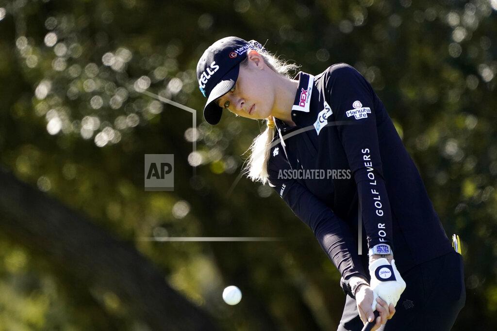 Eric Gay Nelly Korda chips on the 11th green during a practice round for the U.S. Women's Open golf tournament, Tuesday, Dec. 8, 2020, in Houston. (AP Photo/Eric Gay)