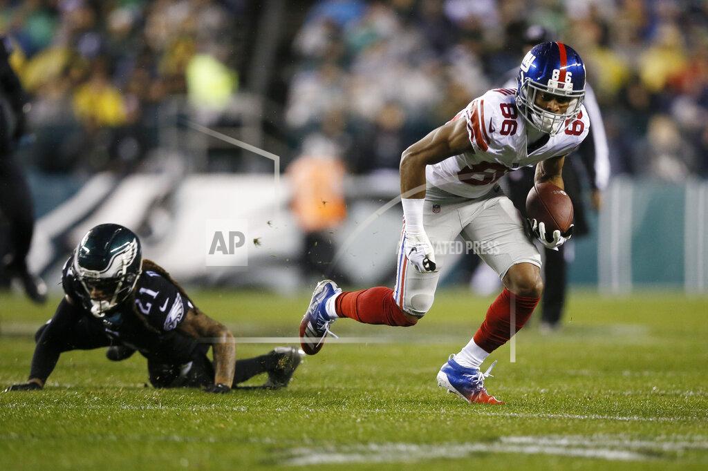 Michael Perez New York Giants' Darius Slayton (86) breaks free from Philadelphia Eagles' Ronald Darby (21) to score a touchdown during the first half of an NFL football game, Monday, Dec. 9, 2019, in Philadelphia. (AP Photo/Michael Perez)
