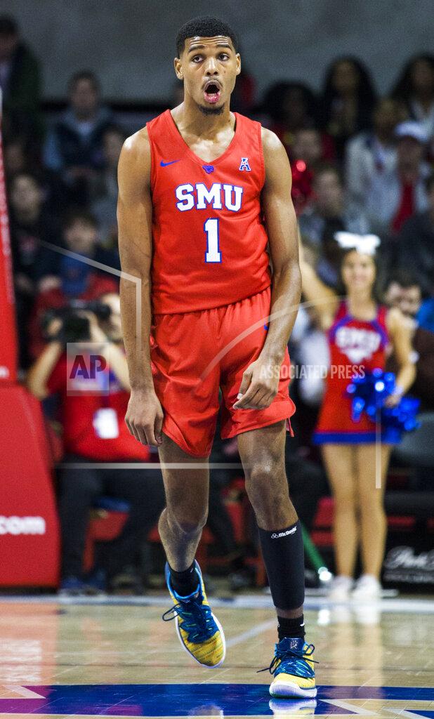 Ashley Landis SMU forward Feron Hunt (1) celebrates a three pointer during the first half of an NCAA college basketball game against Connecticut Wednesday, Feb. 12, 2020, in Dallas. (Ashley Landis/The Dallas Morning News via AP)