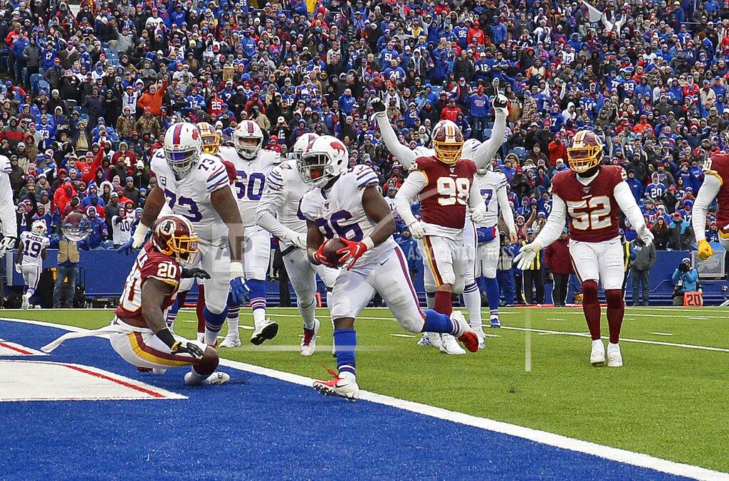 Adrian Kraus Buffalo Bills running back Devin Singletary (26) rushes for a two-yard touchdown during the second half of an NFL football game against the Washington Redskins, Sunday, Nov. 3, 2019, in Orchard Park, N.Y. (AP Photo/Adrian Kraus)