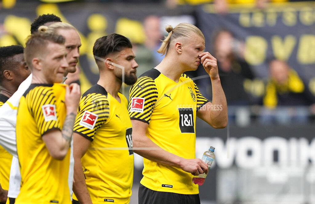 Martin Meissner Dortmund's Erling Haaland, right, reacts disappointed in front of their supporters after losing the German Bundesliga soccer match between Borussia Dortmund and VfL Bochum in Dortmund, Germany, Saturday, April 30, 2022. (AP Photo/Martin Meissner)