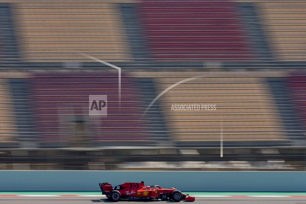 Joan Monfort FILE - In this file photo dated Friday, March 1, 2019, Ferrari driver Sebastian Vettel of Germany during a Formula One pre-season testing session at the Barcelona Catalunya racetrack in Montmelo, outside Barcelona, Spain. Previewing the upcoming 2019 season, after two seasons cracking under pressure, this may be Sebastian Vettel’s last chance to show he can deliver a long-awaited Formula One title for Ferrari. (AP Photo/Joan Monfort, FILE)