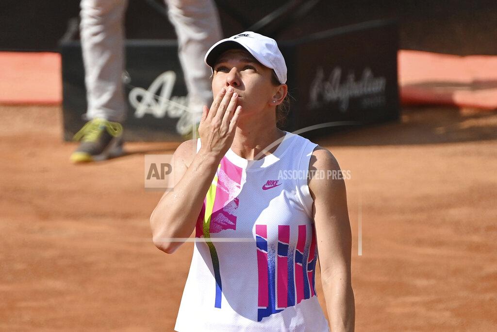 Alfredo Falcone Romania's Simona Halep reacts during her match with Ukraine's Dayana Yastremska during their Italian Open tennis tournament match, in Rome, Friday, Sept. 18, 2020. (Alfredo Falcone/LaPresse via AP)