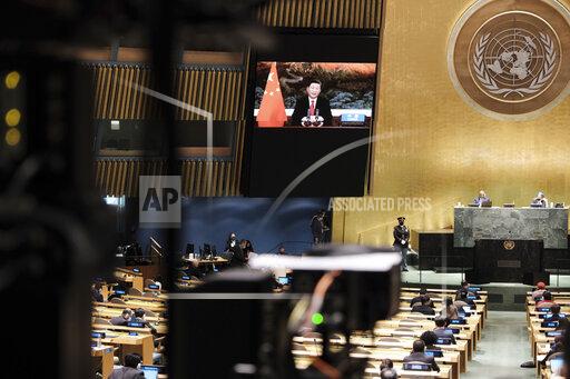 China's President Xi Jinping remotely addresses the 76th session of the United Nations General Assembly in a pre-recorded message, Tuesday Sept. 21, 2021, at UN headquarters. (Spencer Platt/Pool Photo via AP)