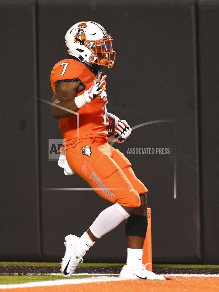 Brody Schmidt Oklahoma state running back LD Brown scores a touchdown during the fourth quarter of an NCAA college football game against Missouri State in Stillwater, Okla., Thursday, Aug. 30, 2018. Oklahoma State won 58-17. (AP Photo/Brody Schmidt)