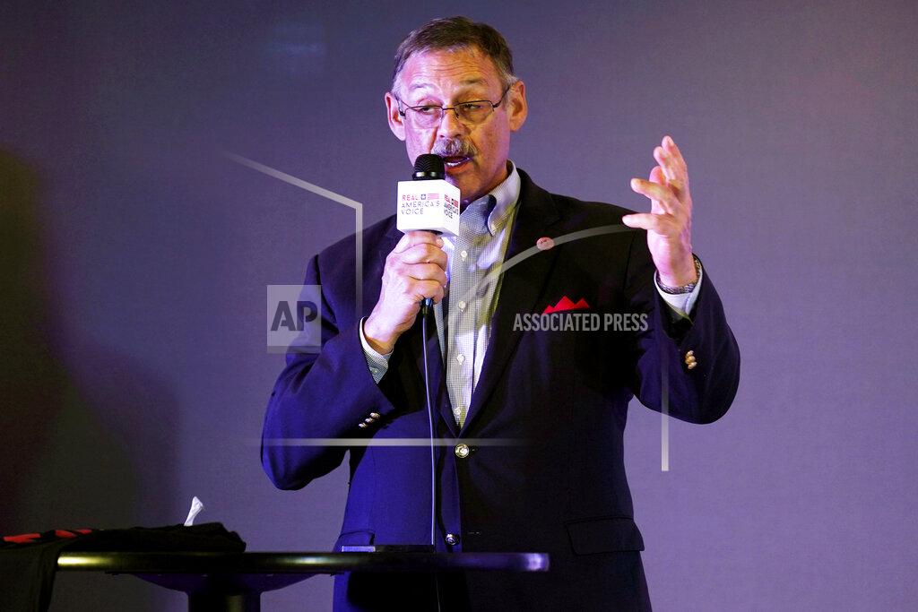 Steve Helber Rep. Mark Finchem, of Arizona, gestures as he speaks during an election rally in Richmond, Va., Wednesday, Oct. 13, 2021. Conservative radio host John Fredericks, a former Trump campaign chairman in Virginia, organized the “Take Back Virginia Rally” that drew at least a few hundred people in the Richmond suburbs to fire up the GOP's right wing in the runup to the Nov. 2 elections. (AP Photo/Steve Helber)
