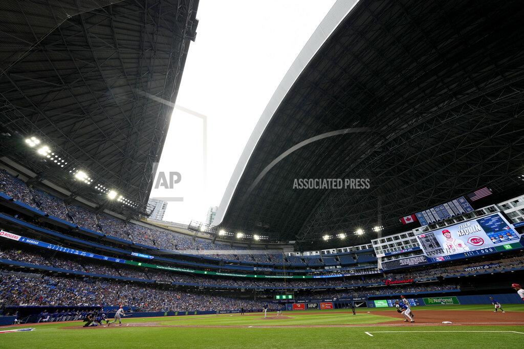 Frank Gunn The roof is opened at the Rogers Centre following a storm that passed over the city during the fourth inning of a baseball game between the Toronto Blue Jays and the Cincinnati Reds in Toronto, Saturday, May 21, 2022. (Frank Gunn/The Canadian Press via AP)