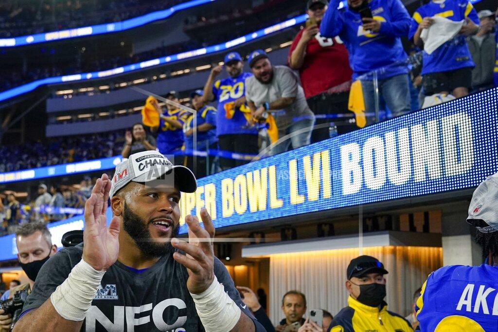 Mark J. Terrill Los Angeles Rams' Aaron Donald celebrates after the NFC Championship NFL football game against the San Francisco 49ers Sunday, Jan. 30, 2022, in Inglewood, Calif. The Rams won 20-17 to advance to the Super Bowl. (AP Photo/Mark J. Terrill)