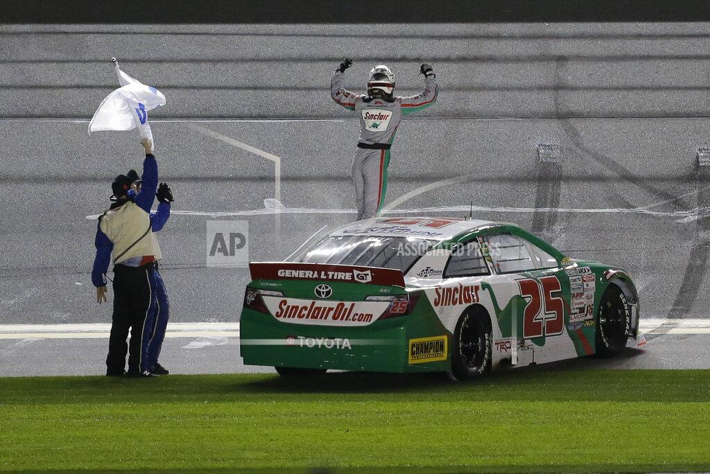 Terry Renna Michael Self, right, celebrates with crew members in front of fans after winning the ARCA auto race at Daytona International Speedway, Saturday, Feb. 8, 2020, in Daytona Beach, Fla. (AP Photo/Terry Renna)