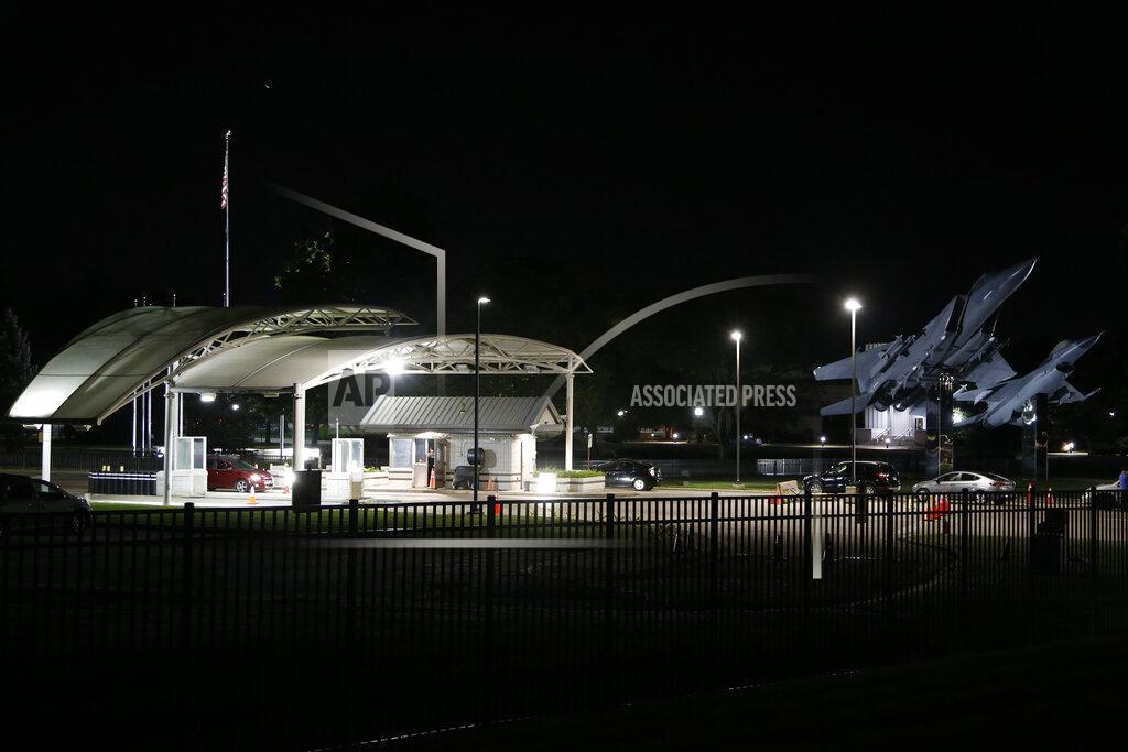 Jay Laprete People wait in their cars inside the main gate of Wright-Patterson Air Force Base during a lockdown Friday, Sept. 10, 2021, in Dayton, Ohio. The base was put on lockdown due to a report of an active shooter but was later given the all clear. (AP Photo/Jay LaPrete)
