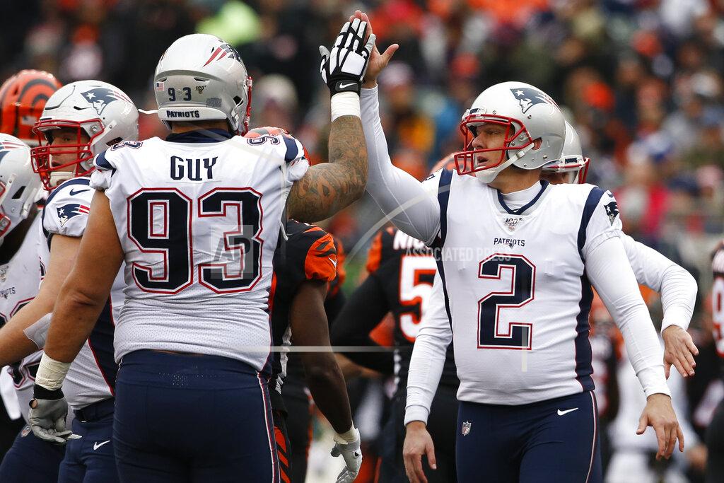 Gary Landers New England Patriots kicker Nick Folk (2) celebrates his field goal with defensive tackle Lawrence Guy (93) in the first half of an NFL football game, Sunday, Dec. 15, 2019, in Cincinnati. (AP Photo/Gary Landers)