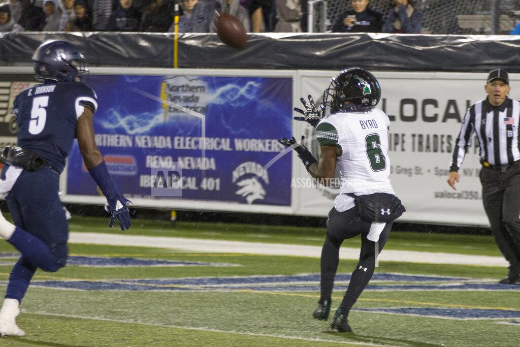 Tom R. Smedes Hawaii wide receiver Cedric Byrd II (6) make the catch for a touchdown over Nevada's Emany Johnson (5) in the first half of an NCAA college football game in Reno, Nev. Saturday, Sept. 28, 2019. (AP Photo/Tom R. Smedes)