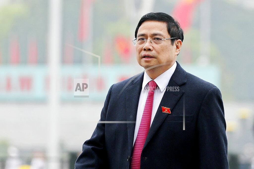 Minh Hoang Pham Minh Chinh, a member of the Communist party's central committee for personnel and organization, enters the hall of the National Assembly in Hanoi, Vietnam on March 24, 2021. Vietnam's legislature voted Monday, April 5, 2021, to make Pham Minh Chinh the country's next prime minister. Outgoing Prime Minister Nguyen Xuan Phuc was appointed the new president. (AP Photo/Minh Hoang)