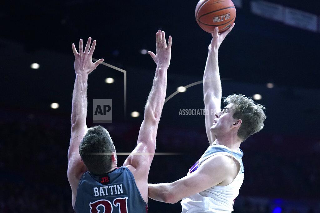 Rick Scuteri Arizona forward Stone Gettings shoots over Utah forward Riley Battin (21) during the second half of an NCAA college basketball game Thursday, Jan. 16, 2020, in Tucson, Ariz. Arizona won 93-77. (AP Photo/Rick Scuteri)