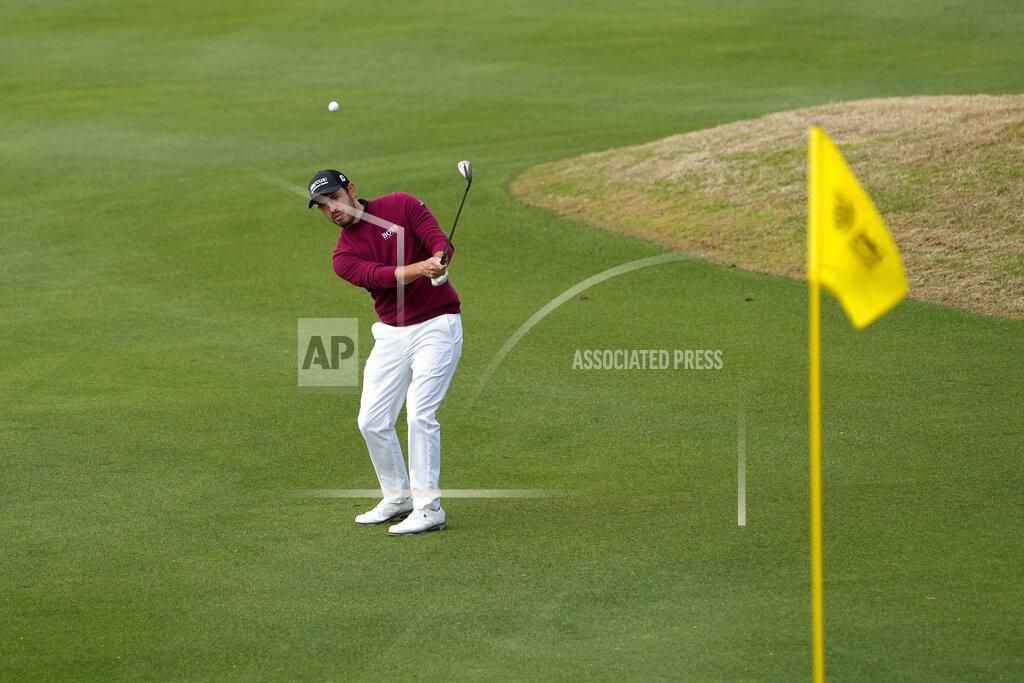 David J. Phillip Patrick Cantlay hits onto the fifth green during a first round match at the Dell Technologies Match Play Championship golf tournament Wednesday, March 24, 2021, in Austin, Texas. (AP Photo/David J. Phillip)