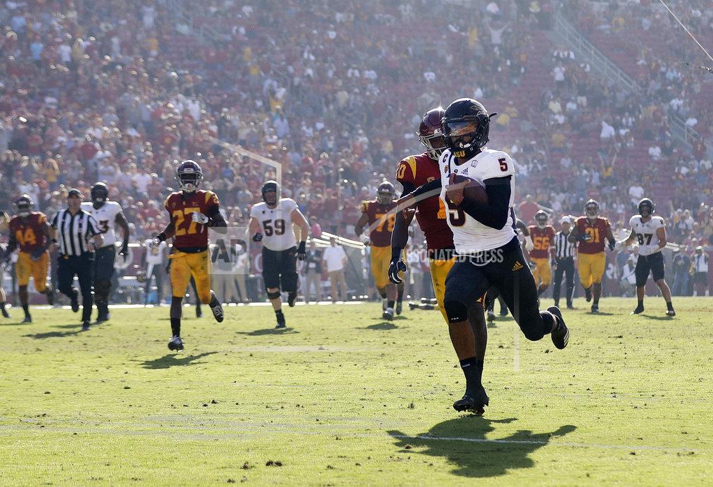 Marcio Jose Sanchez Arizona State quarterback Manny Wilkins (5) runs for a touchdown against Southern California during the second half of an NCAA college football game Saturday, Oct. 27, 2018, in Los Angeles. (AP Photo/Marcio Jose Sanchez)