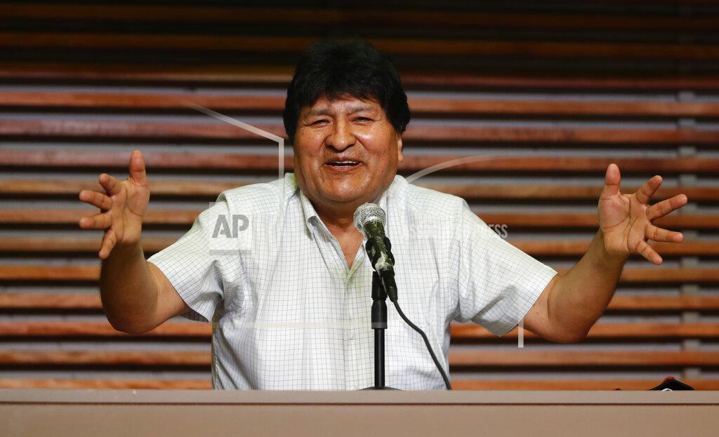 Natacha Pisarenko Former Bolivian President Evo Morales gives a press conference in Buenos Aires, Argentina, one day after general elections in his home country, Monday, Oct. 19, 2020. Morales’ party claimed victory in a presidential election that appeared to reject the right-wing policies of the interim government that took power in Bolivia after the leftist leader resigned and fled the country a year ago. (AP Photo/Natacha Pisarenko)