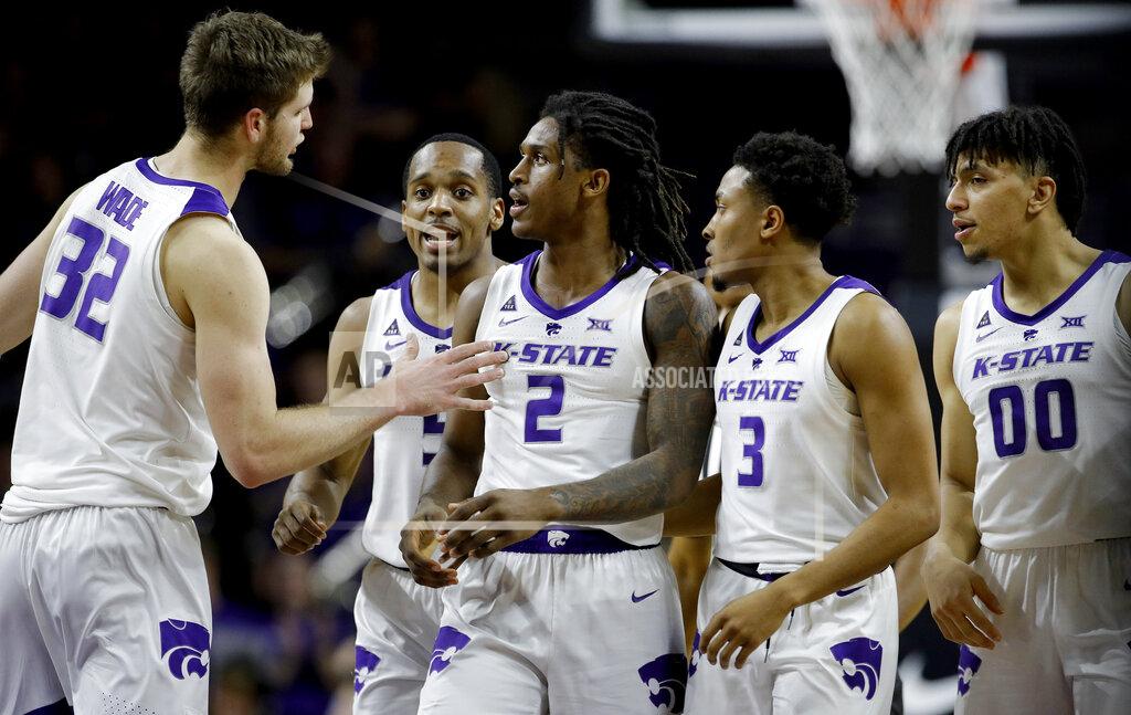 Charlie Riedel Teammates gather around Kansas State's Cartier Diarra (2) after he drew a foul during the second half of an NCAA college basketball game against Texas Tech Tuesday, Jan. 22, 2019, in Manhattan, Kan. Kansas State won 58-45. (AP Photo/Charlie Riedel)
