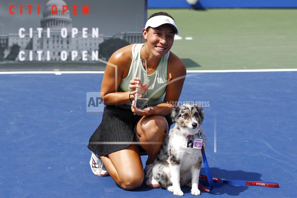 Patrick Semansky Jessica Pegula poses with a trophy and her dog Maddie after defeating Camila Giorgi, of Italy, in a final match at the Citi Open tennis tournament, Sunday, Aug. 4, 2019, in Washington. (AP Photo/Patrick Semansky)