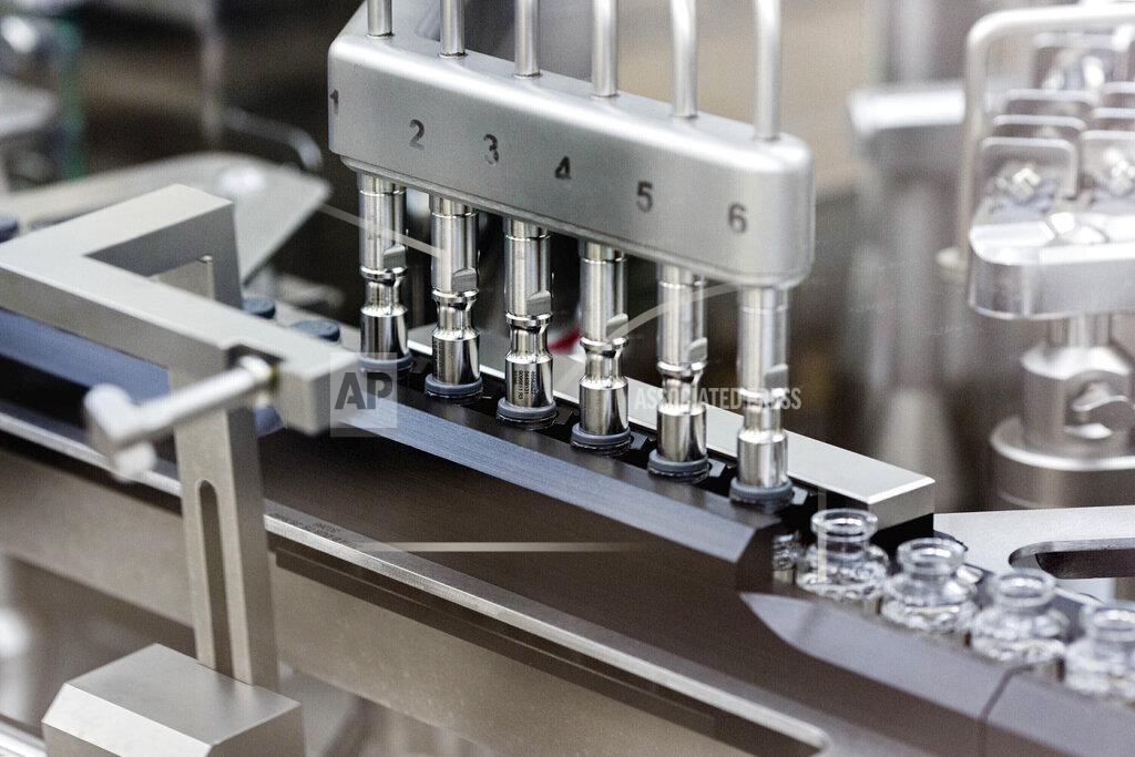 FILE - In this March 2020 photo provided by Gilead Sciences, rubber stoppers are placed onto filled vials of the investigational drug remdesivir at a Gilead manufacturing site in the United States. On Thursday, Oct. 22, 2020, the U.S. Food and Drug Administration has approved the first drug to treat COVID-19: remdesivir, an antiviral medicine given through an IV for patients needing hospitalization. The drug, which California-based Gilead Sciences Inc. is calling Veklury, cut the time to recovery by five days on average in a large study led by the U.S. National Institutes of Health. (Gilead Sciences via AP)