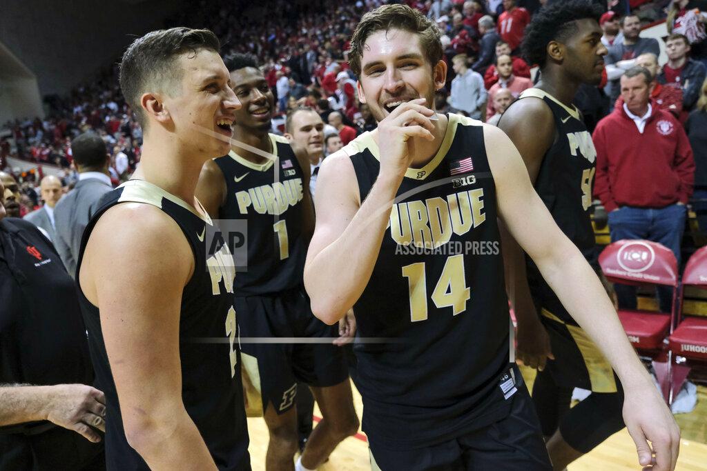 Aj Mast Purdue guard Ryan Cline (14) smiles with teammate Grady Eifert while leaving the court after Purdue defeated Indiana 48-46 in an NCAA college basketball game in Bloomington, Ind., Tuesday, Feb. 19, 2019. (AP Photo/AJ Mast)