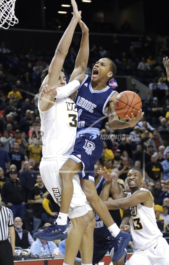 Frank Franklin Ii Rhode Island's Fatts Russell, right, drives against VCU's Marcus Santos-Silva, left, during the second half of an NCAA college basketball game in the Atlantic 10 men's tournament Friday, March 15, 2019, in New York. Rhode Island won 75-70. (AP Photo/Frank Franklin II)