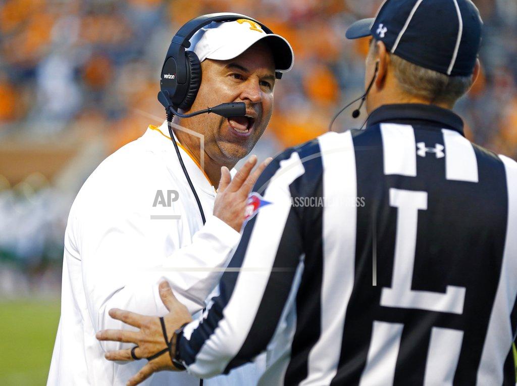 Wade Payne Tennessee head coach Jeremy Pruitt argues a call with linesman John Langlois in the second half of an NCAA college football game against Charlotte Saturday, Nov. 3, 2018, in Knoxville, Tenn. Tennessee won 14-3. (AP Photo/Wade Payne)
