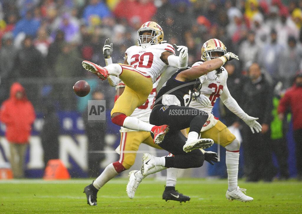 Nick Wass San Francisco 49ers free safety Jimmie Ward (20) looses control of the ball against Baltimore Ravens tight end Mark Andrews (89) in the second half of an NFL football game, Sunday, Dec. 1, 2019, in Baltimore, Md. (AP Photo/Nick Wass)