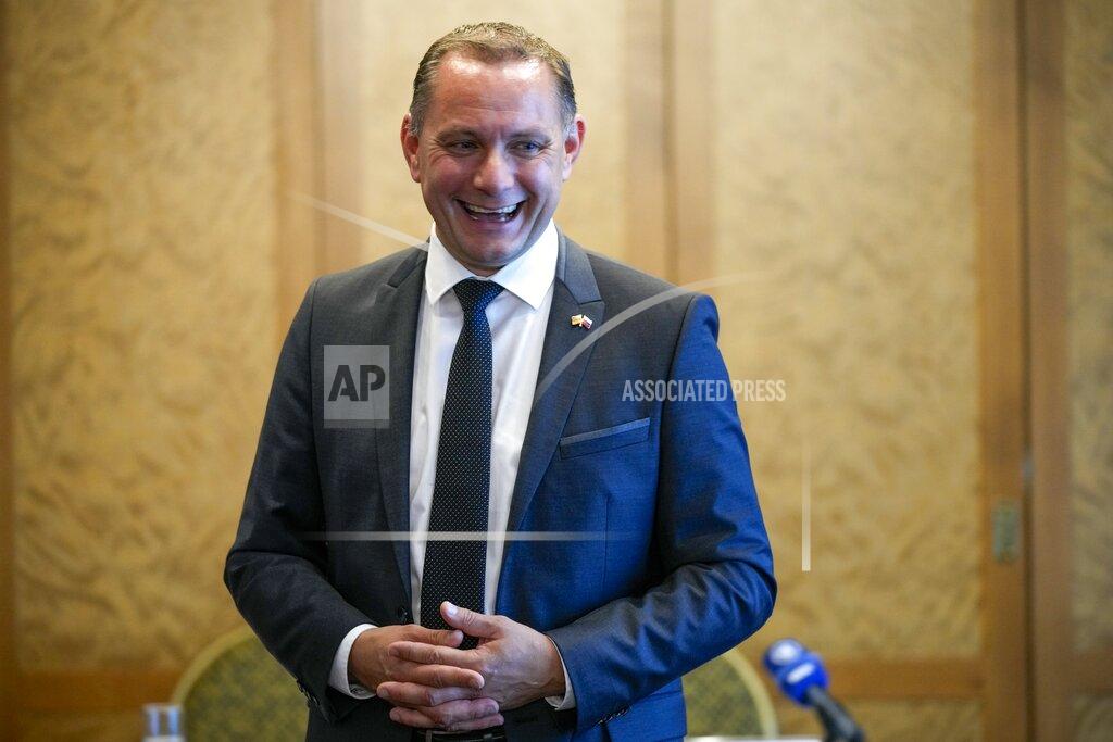 Alexander Zemlianichenko FILE - In this Thursday, June 24, 2021 file photo Germany's far-right 'Alternative for Germany' (AfD) spokesperson Tino Chrupalla smiles after a news conference in Moscow, Russia. Migration is a side issue in this year's German election campaign, but that hasn't stopped the country's biggest far-right party from trying to play it up. (AP Photo/Alexander Zemlianichenko)