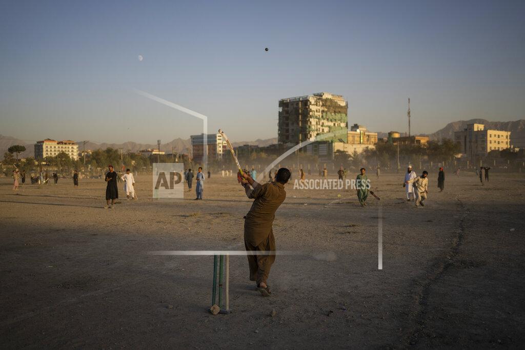 Bernat Armangue Afghans play cricket at the Chaman-e-Hozari Park in Kabul, Afghanistan, Friday, Sept. 17, 2021. (AP Photo/Bernat Armangue)