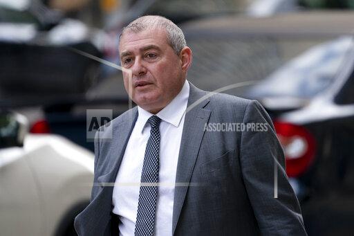 Lev Parnas walks past criminal court, Monday, Oct. 18, 2021, in New York. Parnas, a onetime associate of Rudy Giuliani, is accused along with a co-defendant of making illegal campaign contributions. (AP Photo/John Minchillo)