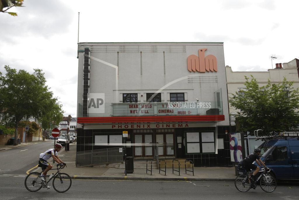 Matt Dunham The independent Phoenix Cinema with a coronavirus message written where the name of a movie would normally appear, stands temporarily closed as part of the nationwide coronavirus lockdown in East Finchley, north London, Friday, May 22, 2020. (AP Photo/Matt Dunham)
