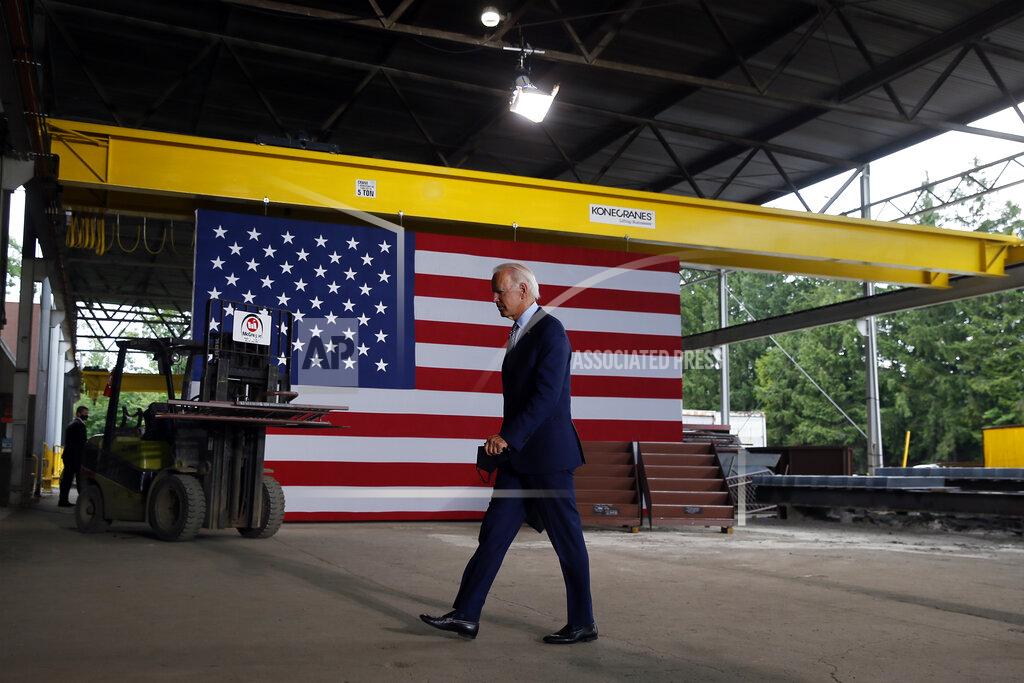 Matt Slocum FILE - In this July 9, 2020, file photo Democratic presidential candidate former Vice President Joe Biden walks from the podium after speaking at McGregor Industries in Dunmore, Pa. Biden is pledging to define his presidency by a sweeping economic agenda beyond anything Americans have seen since the Great Depression and the industrial mobilization for World War II. (AP Photo/Matt Slocum, File)