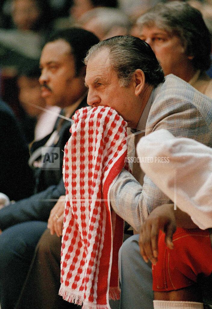 Uncredited FILE - In this April 4, 1983, file photo, Guy Lewis, head coach of Houston, watches his team play North Carolina State in the NCAA championship game in Albuquerque, N.M. North Carolina defeating top-ranked Houston 54-52. (AP Photo/Fle)