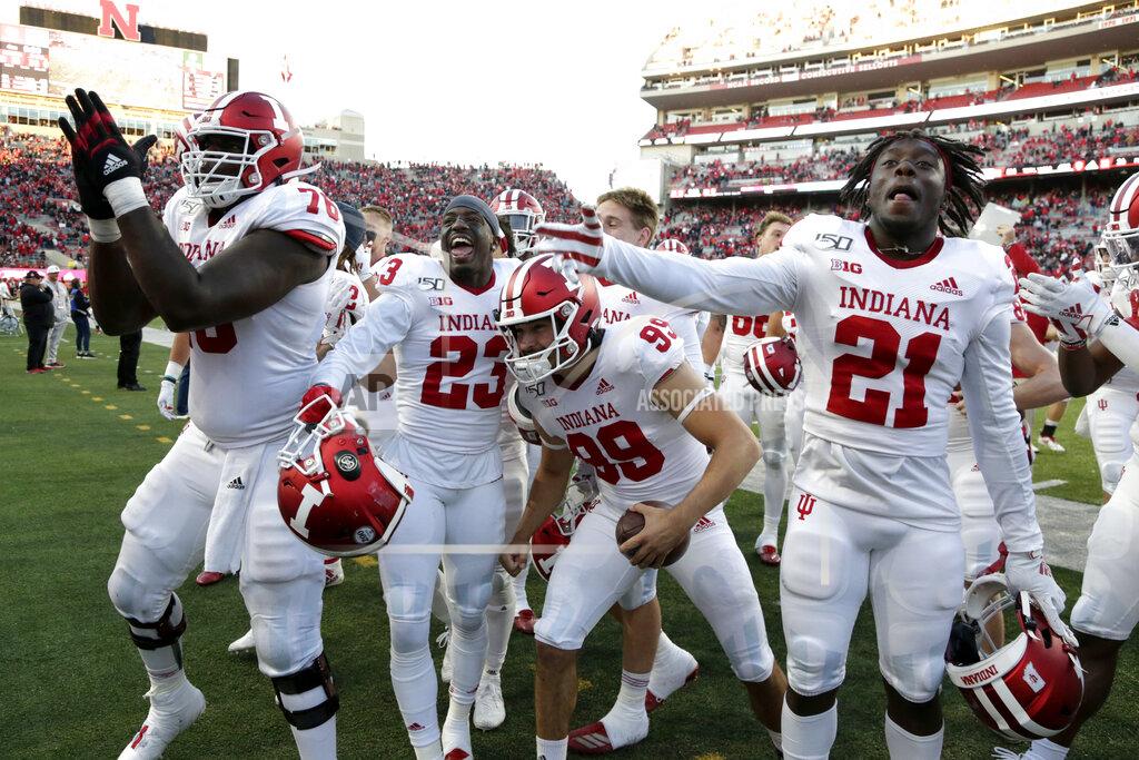 Nati Harnik Indiana players celebrate with supporters after their 38-31 win over Nebraska in an NCAA college football game in Lincoln, Neb., Saturday, Oct. 26, 2019. (AP Photo/Nati Harnik)