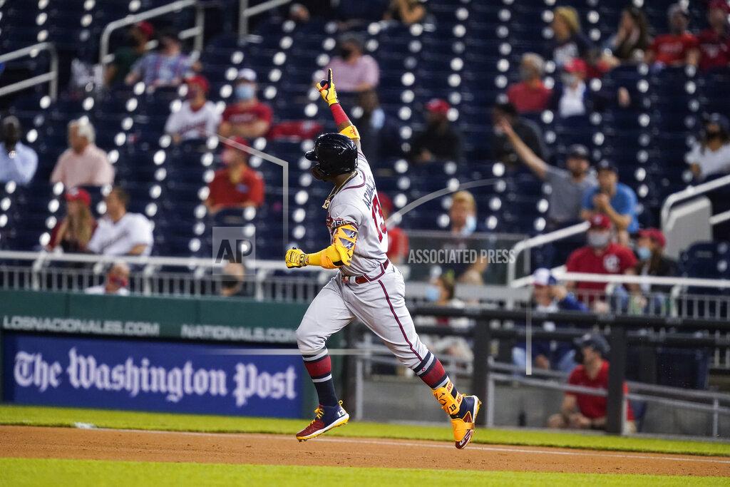 Alex Brandon Atlanta Braves' Ronald Acuña Jr. runs the bases for his solo home run during the fifth inning of baseball game against the Washington Nationals at Nationals Park, Tuesday, May 4, 2021, in Washington. (AP Photo/Alex Brandon)