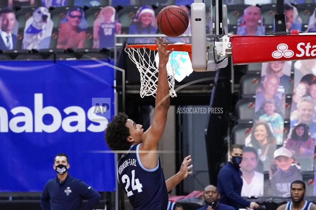 Mary Altaffer Villanova forward Jeremiah Robinson-Earl scores a goal during the second half of an NCAA college basketball game against Seton Hall, Saturday, Jan. 30, 2021, in Newark, N.J. (AP Photo/Mary Altaffer)