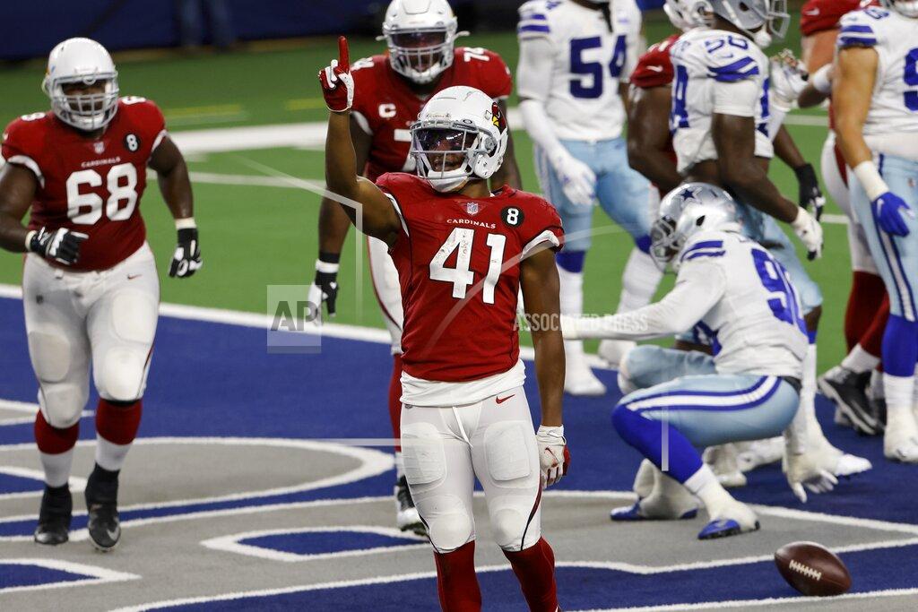 Ron Jenkins Arizona Cardinals running back Kenyan Drake (41) celebrates carrying the ball and running it for a touchdown in the first half of an NFL football game against the Dallas Cowboys in Arlington, Texas, Monday, Oct. 19, 2020. (AP Photo/Ron Jenkins)