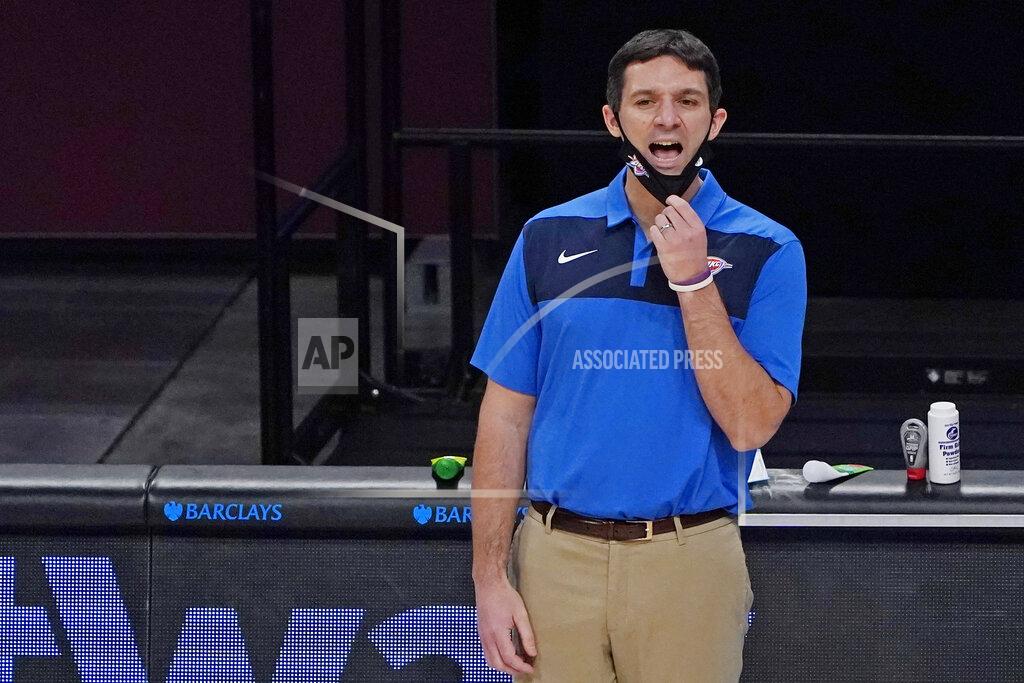 Kathy Willens Oklahoma City Thunder head coach Mark Daigneault pulls his mask down to yell at his players during the second half of an NBA basketball game against the Brooklyn Nets, Sunday, Jan. 10, 2021, in New York. (AP Photo/Kathy Willens)