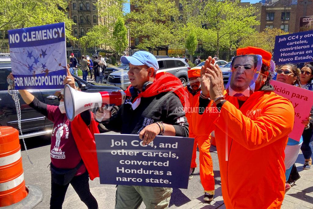 David R. Martin Demonstrators gather outside Manhattan federal court to protest former Honduran President Juan Orlando Hernandez, who pleaded not guilty to charges that he received millions of dollars from 2004 to 2022 to support a drug trade that delivered hundreds of thousands of kilos of drugs to the U.S., Tuesday, May 10, 2022, in New York. (AP Photo/David R. Martin)
