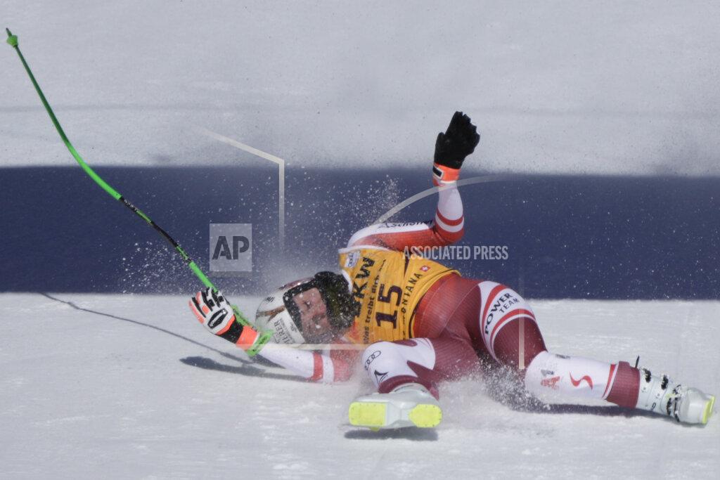 Giovanni Auletta Austria's Cornelia Huetter falls during an alpine ski, women's World Cup downhill race, in Crans Montana, Switzerland, Sunday, Feb. 27, 2022. (AP Photo/Giovanni Auletta)