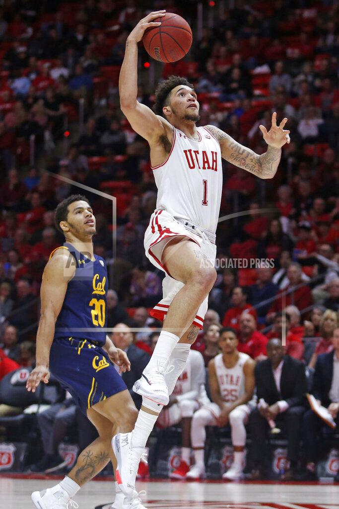 Rick Bowmer Utah forward Timmy Allen (1) goes to the basket as California guard Matt Bradley (20) watches during the second half of an NCAA college basketball game Saturday, Feb. 8, 2020, in Salt Lake City. (AP Photo/Rick Bowmer)