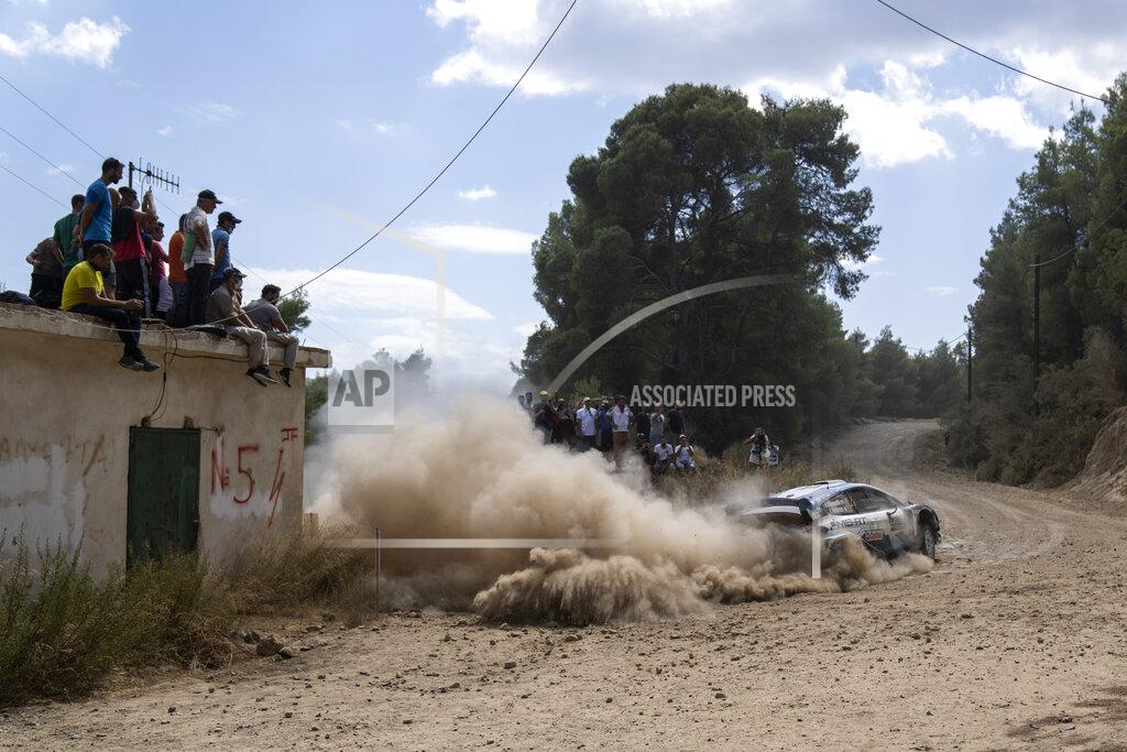 Petros Giannakouris Gus Greensmith from Britain and his co driver Chris Patterson with their Ford Fiesta WRC car compete in the WRC Acropolis Rally at the stage of Aghii Theodori, west of Athens, on Friday, Sept. 10, 2021. The World Rally Championship returned to Greece after an eight-year absence. (AP Photo/Petros Giannakouris)