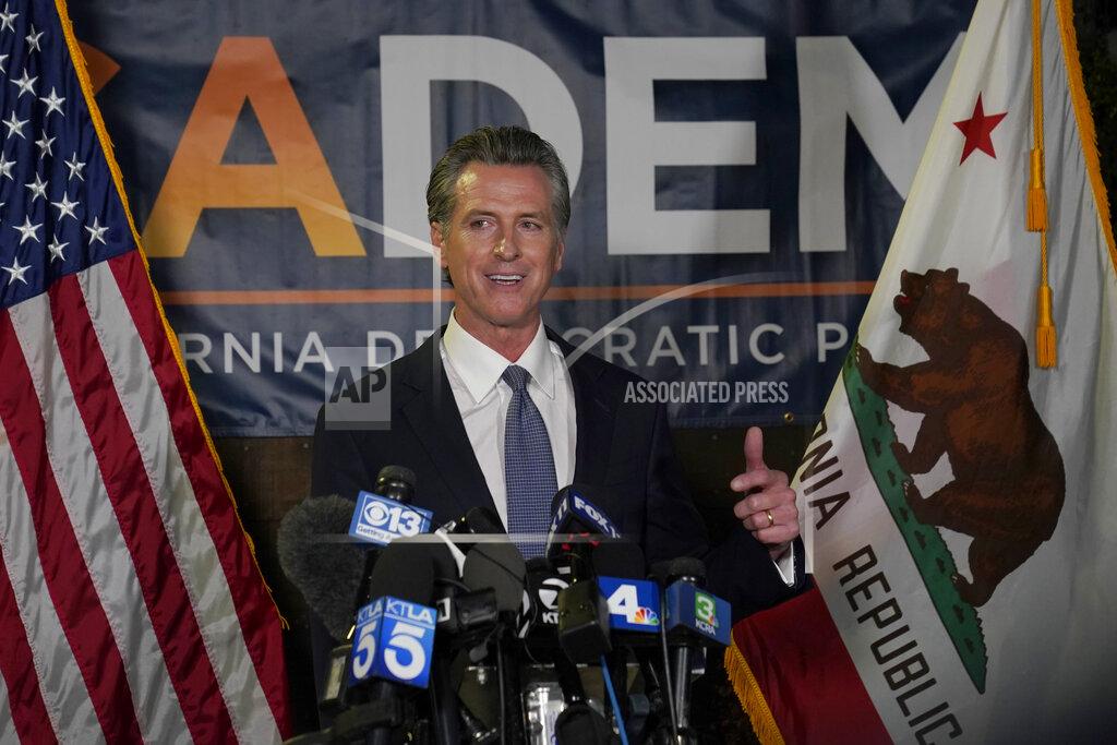 Rich Pedroncelli California Gov. Gavin Newsom addresses reporters, after beating back the recall attempt that aimed to remove him from office, at the John L. Burton California Democratic Party headquarters in Sacramento, Calif., Tuesday, Sept. 14, 2021. (AP Photo/Rich Pedroncelli)