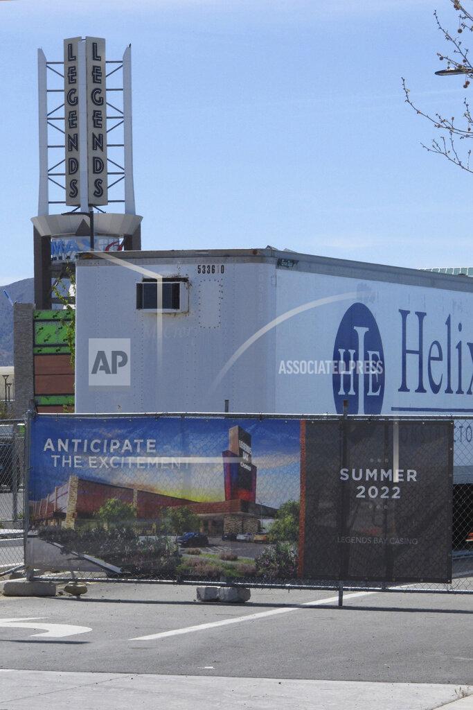 Scott Sonner A rendering of the Legends Bay Casino is displayed on a fence, Friday, May 13, 202, in Sparks, Nev., around the construction site where the first new casino in the Reno-Sparks area in a quarter-century is scheduled to open this summer at The Outlets at Legends shopping center along I-80 next to the Sparks Marina. Las Vegas-based Circa Sports will operate the sports book inside Olympia Gaming's 80,000-square-foot casino, which also will include table games, slots and video poker. (AP Photo/Scott Sonner)