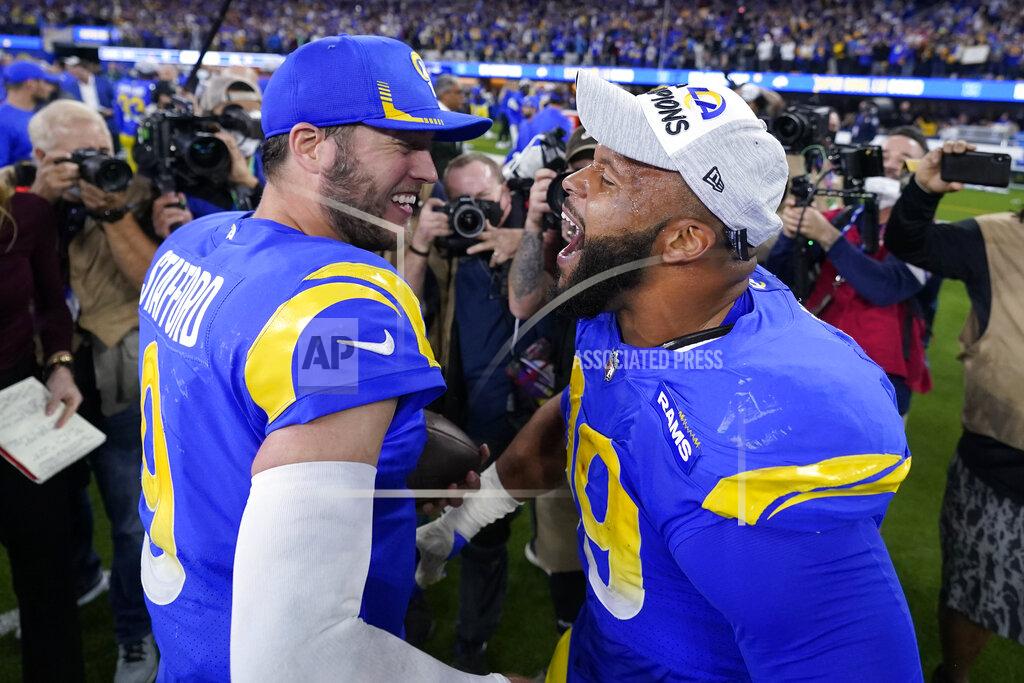 Marcio Jose Sanchez FILE - Los Angeles Rams' Matthew Stafford, left, and Aaron Donald celebrate after the NFC Championship NFL football game against the San Francisco 49ers Sunday, Jan. 30, 2022, in Inglewood, Calif. Stafford, Donald and the Los Angeles Rams will raise their Super Bowl banner Thursday night before kicking off the NFL season at home where they became the first team to hoist the Vince Lombardi trophy in their own stadium. (AP Photo/Marcio Jose Sanchez, File)